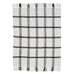 cream, black, and red plaid woven throw blanket