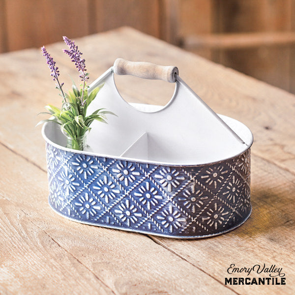 blue and white metal embossed divided caddy with wood handle