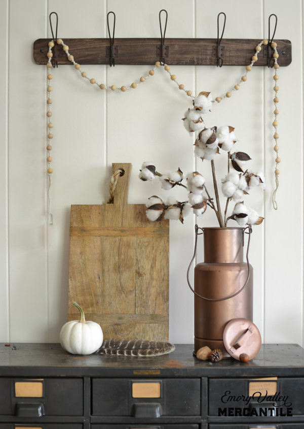 cotton faux stem spray in copper finish container