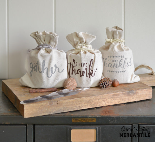 pumpkin pie scented candle in canvas bag with fall greeting