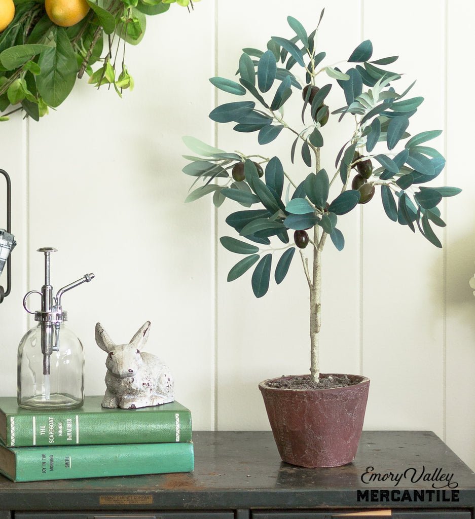 faux artificial olive tree in terracotta pot