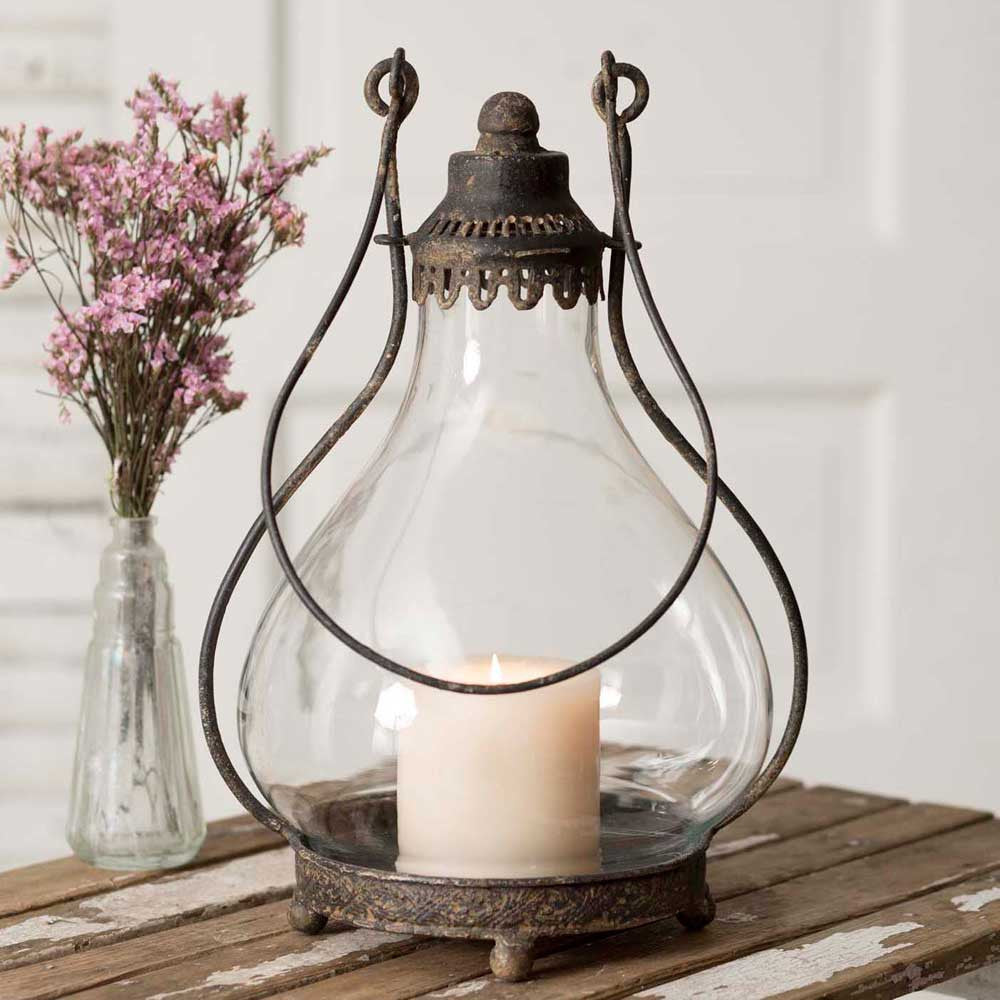 Glass and metal hurricane style candle lantern