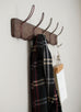rustic wood wall rack with wire hooks