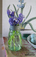 mini mason jar with flower frog lid
