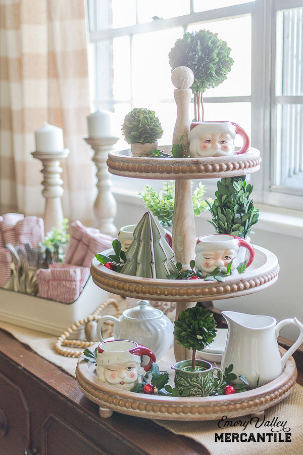 three tiered wood stand tray with beaded edge decorated for Christmas