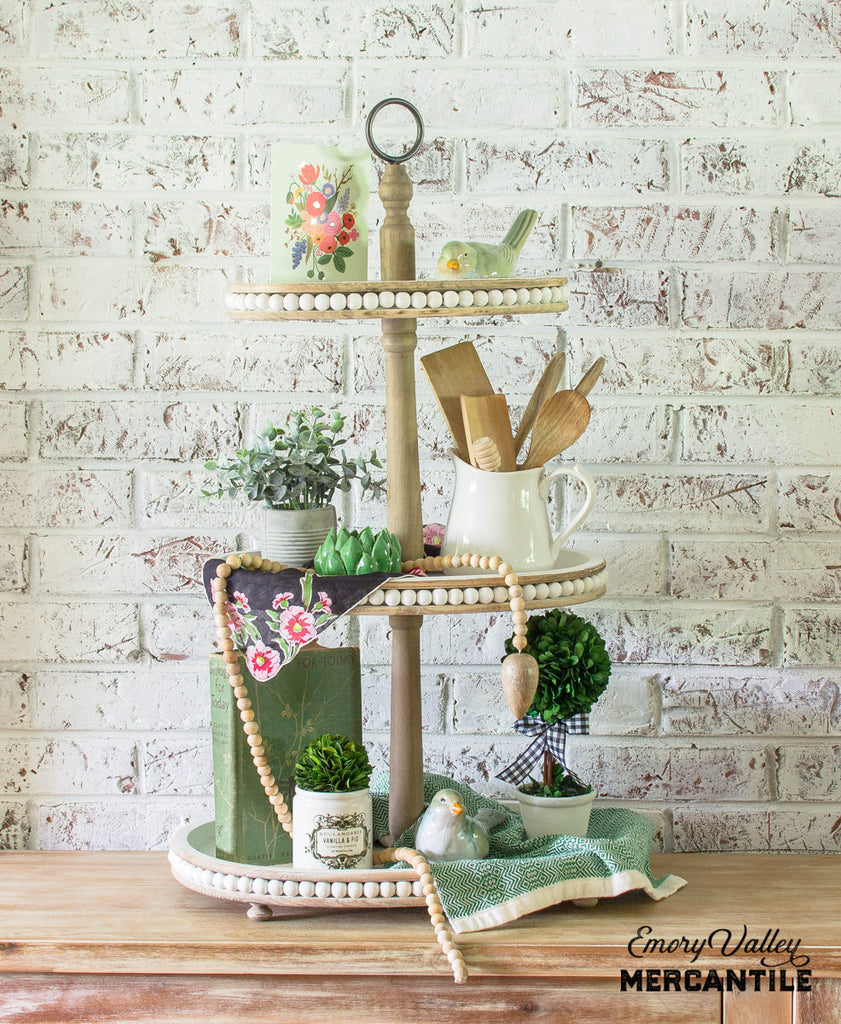 tiered wood tray with beaded edge