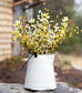 white farmhouse style metal pitcher with handle