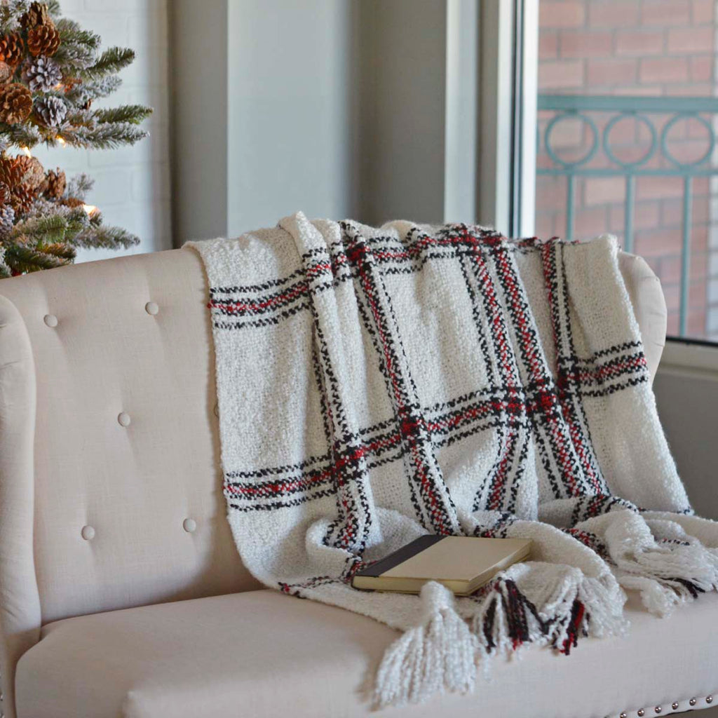 black, cream, and red plaid throw blanket