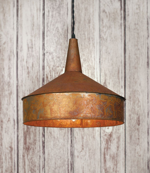 Rustic farmhouse style pendant light made from a funnel and painted copper