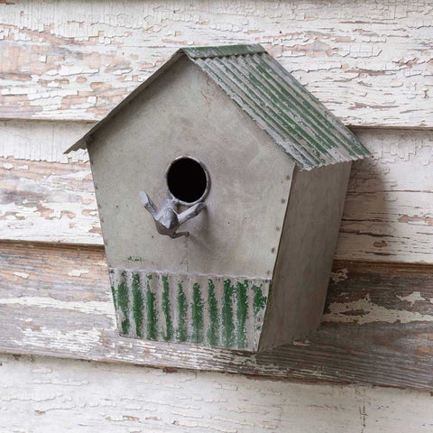 metal birdhouse with corrugated roof