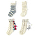 hand knit wool stocking with tassels and poms