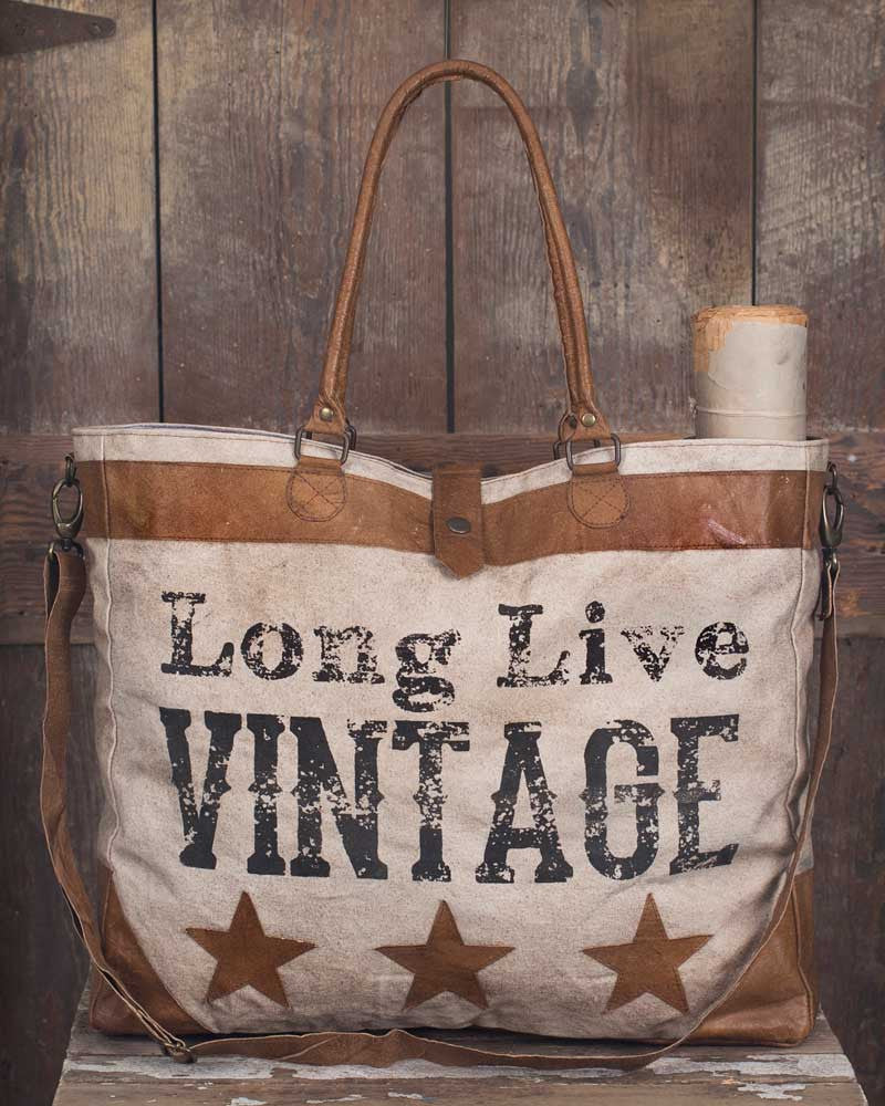 Long live vintage canvas and leather tote