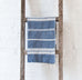 ehtically crafted blue and white kitchen towel with fringe