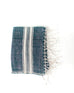 ehtically crafted blue and white kitchen towel with fringe