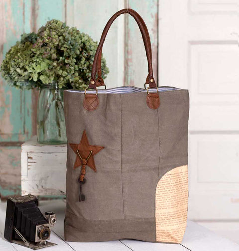canvas and leather tote with leather handles