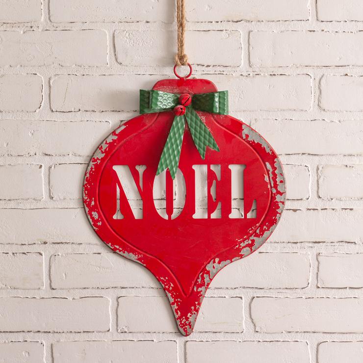 ornament shaped red noel sign