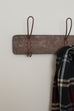rustic wood wall rack with wire hooks