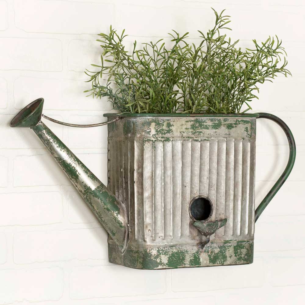 metal watering can birdhouse planter